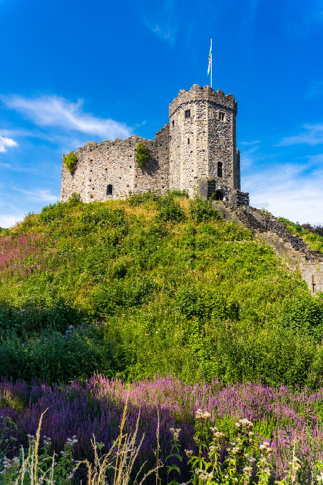 A hilltop castle above open countryside