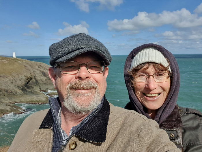 A couple out walking on the coast